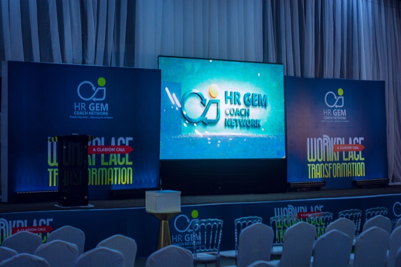 The Workplace Transformation stage with HR GEM Coach Network screens before guests arrive
